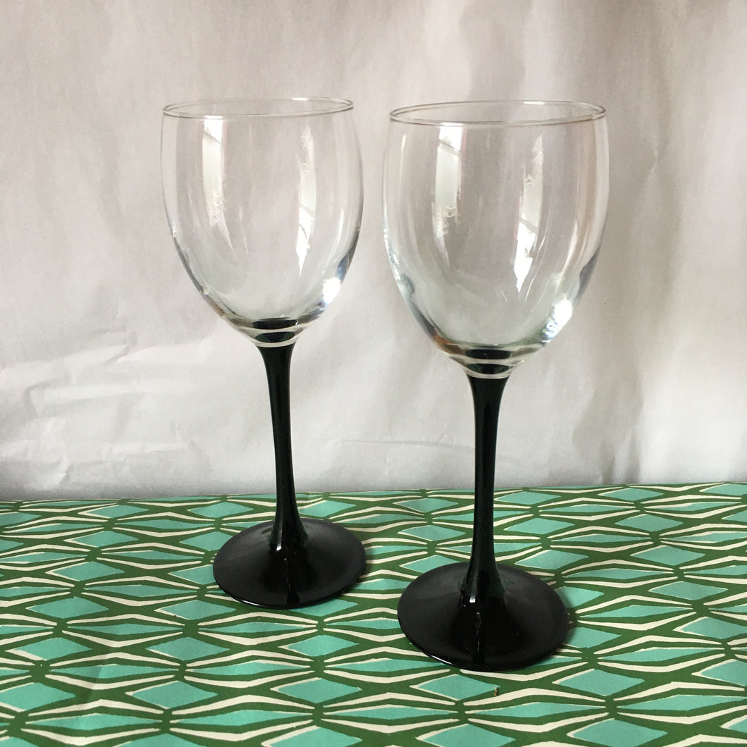 A pair of 1980's french black stemmed wine glasses